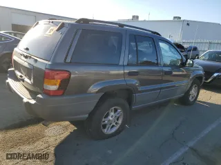 2002 Jeep Grand Cherokee Laredo with VIN 1J4GW48N32C200645, listed as a Copart auction lot 88174715 with 112,129 mi miles and Clean Title. Bid and sale history available at carsss.com. Image 3.