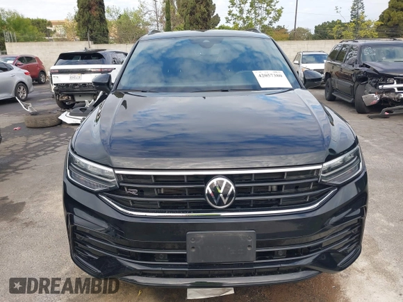 2022 Volkswagen Tiguan SE R-Line Black z VIN 3VVCB7AX6NM165794, wystawiony jako IAAI lot #42057380 z przebiegiem 25 700 mil mil oraz . Historia ofert i sprzedaży dostępna na DreamBid. Obrazek 13.