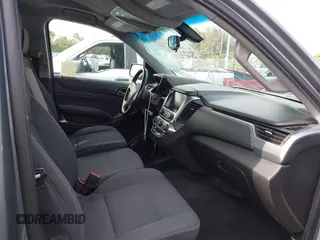 2018 Chevrolet Tahoe LS with VIN 1GNSCAEC2JR306131, listed as a IAAI auction lot 42338873 with 107,652 mi miles and . Bid and sale history available at DreamBid. Image 5.
