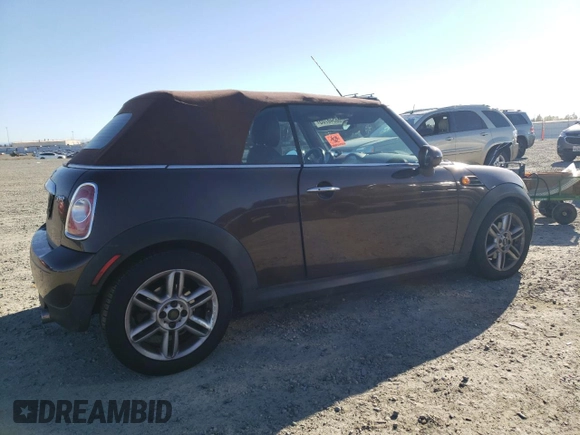 2012 MINI Convertible with VIN WMWZN3C55CT133967, listed as a Copart auction lot 88546705 with 104,357 mi miles and Non repairable. Bid and sale history available at DreamBid. Image 3.