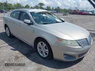 2009 Lincoln MKS z VIN 1LNHM93R59G615147, wystawiony jako IAAI lot #41940056 z przebiegiem 140 903 mil mil oraz . Historia ofert i sprzedaży dostępna na DreamBid. Obrazek 1.