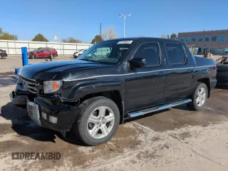 2012 Honda Ridgeline RTL z VIN 5FPYK1F50CB457894, wystawiony jako Copart lot #52154845 z przebiegiem 140 056 mil mil oraz Szkoda całkowita • Salvage title. Historia ofert i sprzedaży dostępna na DreamBid. Obrazek 1.