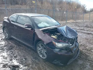 2012 Scion tC with VIN JTKJF5C70C3034489, listed as a IAAI auction lot 41678293 with 166,218 mi miles. Bid and sale history available at carsss.com. Image 1.