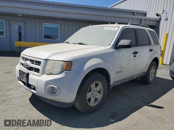 2011 Ford Escape Hybrid z VIN 1FMCU5K39BKA88197, wystawiony jako Copart lot #50896195 z przebiegiem 186 007 mil mil oraz Czysty tytuł • Clean title. Historia ofert i sprzedaży dostępna na DreamBid. Obrazek 1.