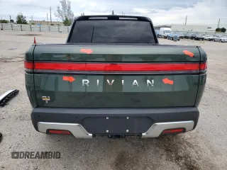 2023 Rivian R1T Adventure z VIN 7FCTGAAA8PN001040, wystawiony jako Copart lot #71517874 z przebiegiem 19 789 mil mil oraz Szkody całkowita. Historia ofert i sprzedaży dostępna na DreamBid. Obrazek 6.