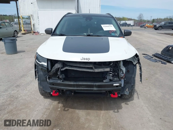 2017 Jeep Compass Trailhawk with VIN 3C4NJDDBXHT500588, listed as a IAAI auction lot 42060556 with 76,788 mi miles and . Bid and sale history available at DreamBid. Image 13.