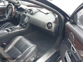 2015 Jaguar XJ with VIN SAJWJ2GD0F8V85914, listed as a IAAI auction lot 41615059 with 115,462 mi miles. Bid and sale history available at carsss.com. Image 5.