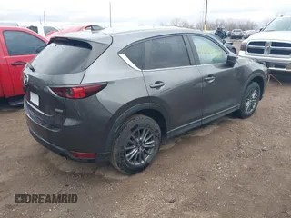 2017 Mazda CX-5 Touring with VIN JM3KFACL3H0148312, listed as a IAAI auction lot 41844634 with 68,534 mi miles and . Bid and sale history available at carsss.com. Image 4.