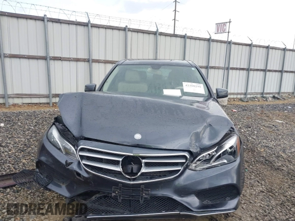 2014 Mercedes-Benz E 350 Sport with VIN WDDHF5KB7EA779952, listed as a IAAI auction lot 42308290 with 100,000 mi miles and . Bid and sale history available at DreamBid. Image 12.