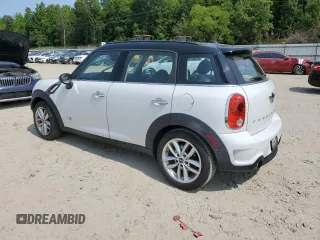 2014 MINI Countryman S with VIN WMWZC5C5XEWP37128, listed as a Copart auction lot 59549885 with 84,121 mi miles and Salvage title. Bid and sale history available at DreamBid. Image 2.
