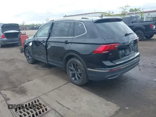 2024 Volkswagen Tiguan SE with VIN 3VVMB7AX7RM042855, listed as a IAAI auction lot 42223748 with 14,077 mi miles and . Bid and sale history available at DreamBid. Image 3.