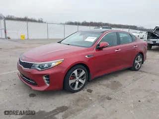 2017 Kia Optima SX with VIN 5XXGW4L24HG141844, listed as a IAAI auction lot 41425880 with 137,056 mi miles. Bid and sale history available at carsss.com. Image 2.