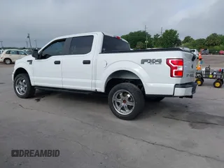 2018 Ford F-150 XL with VIN 1FTEW1E54JFB51565, listed as a IAAI auction lot 41942276 with 131,864 mi miles. Bid and sale history available at carsss.com. Image 3.