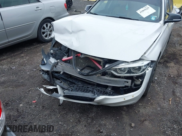 2018 BMW 3 Series 320i xDrive with VIN WBA8E5G52JNU46803, listed as a IAAI auction lot 41869625 with 67,057 mi miles. Bid and sale history available at carsss.com. Image 6.
