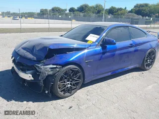 2020 BMW M4 with VIN WBS4Y9C09LFJ02627, listed as a IAAI auction lot 41785396 with 27,424 mi miles. Bid and sale history available at carsss.com. Image 2.