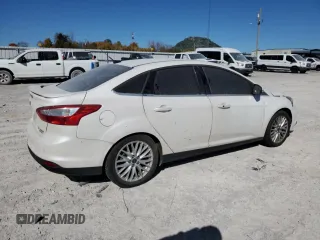 2014 Ford Focus Titanium with VIN 1FADP3J20EL122447, listed as a Copart auction lot 75774344 with 188,413 mi miles and Salvage Title. Bid and sale history available at carsss.com. Image 3.