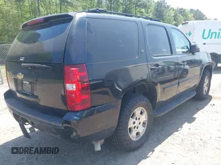 2007 Chevrolet Tahoe LS with VIN 1GNFC13J97R289128, listed as a IAAI auction lot 42071545 with 207,971 mi miles and . Bid and sale history available at DreamBid. Image 4.