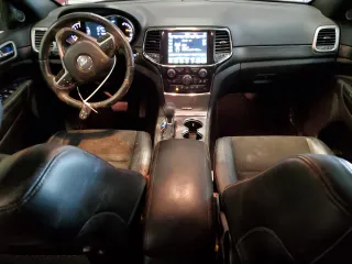 2021 Jeep Grand Cherokee Laredo X with VIN 1C4RJFAG4MC676572, listed as a Copart auction lot 52162605 with 112,437 mi miles and Salvage Title. Bid and sale history available at carsss.com. Image 8.