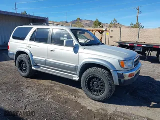 1997 Toyota 4Runner Limited with VIN JT3HN87R5V0090183, listed as a IAAI auction lot 41495647 with 250,664 mi miles. Bid and sale history available at carsss.com. Image 1.