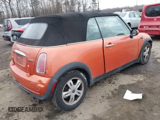 2006 MINI Convertible with VIN WMWRF33566TG14606, listed as a IAAI auction lot 41402790 with 177,081 mi miles and . Bid and sale history available at DreamBid. Image 4.