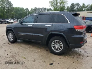 2014 Jeep Grand Cherokee Limited with VIN 1C4RJFBG2EC233725, listed as a Copart auction lot 58524505 with 216,798 mi miles and Salvage title. Bid and sale history available at DreamBid. Image 2.