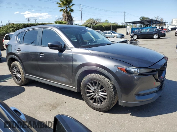 2017 Mazda CX-5 Touring with VIN JM3KFACLXH0131443, listed as a Copart auction lot 48524845 with 102,731 mi miles and Salvage Title. Bid and sale history available at carsss.com. Image 4.