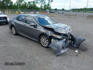 2019 Toyota Camry LE z VIN 4T1B11HK2KU793763, wystawiony jako IAAI lot #42506755 z przebiegiem 164 017 mil mil oraz . Historia ofert i sprzedaży dostępna na DreamBid. Obrazek 1.