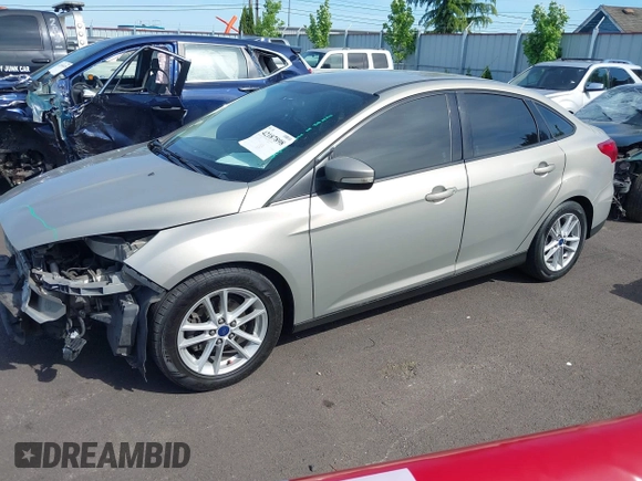 2015 Ford Focus SE z VIN 1FADP3F29FL206003, wystawiony jako IAAI lot #42187898 z przebiegiem 149 560 mil mil oraz . Historia ofert i sprzedaży dostępna na DreamBid. Obrazek 2.