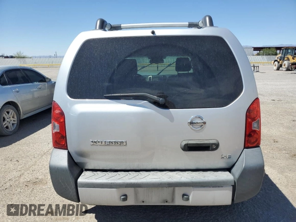2010 Nissan Xterra S with VIN 5N1AN0NU2AC519838, listed as a Copart auction lot 57301355 with 129,990 mi miles and Salvage title. Bid and sale history available at DreamBid. Image 6.