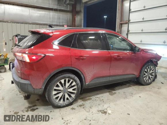2020 Ford Escape Titanium with VIN 1FMCU9J97LUA00654, listed as a Copart auction lot 83695954 with 44,974 mi miles and Salvage title. Bid and sale history available at DreamBid. Image 3.