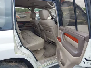 2001 Lexus LX 470 z VIN JTJHT00W613506010, wystawiony jako IAAI lot #42277268 z przebiegiem 186 671 mil mil oraz . Historia ofert i sprzedaży dostępna na DreamBid. Obrazek 8.