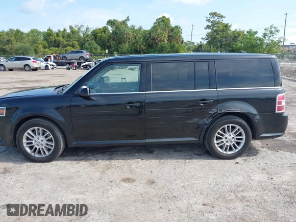 2014 Ford Flex SEL z VIN 2FMGK5C8XEBD13484, wystawiony jako IAAI lot #42235548 z przebiegiem 172 570 mil mil oraz . Historia ofert i sprzedaży dostępna na DreamBid. Obrazek 14.