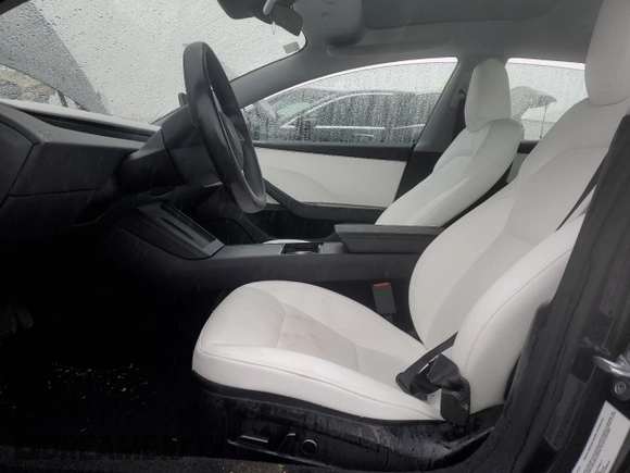 2025 Tesla Model 3 Long Range with VIN 5YJ3E1EB0SF876117, listed as a Copart auction lot 59322455 with 9,022 mi miles and Salvage title. Bid and sale history available at DreamBid. Image 7.