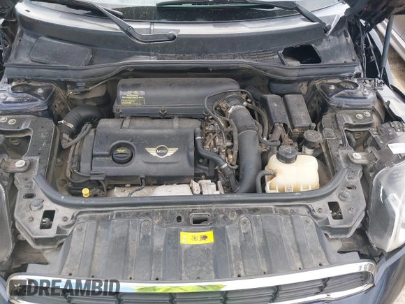 2014 MINI Countryman S with VIN WMWZC3C54EWP26131, listed as a IAAI auction lot 42012162 with 125,869 mi miles and . Bid and sale history available at DreamBid. Image 10.