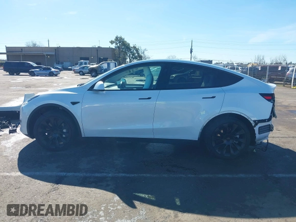 2023 Tesla Model Y Long Range with VIN 7SAYGDEE0PF945202, listed as a IAAI auction lot 41611762 with 7,316 mi miles and . Bid and sale history available at DreamBid. Image 14.