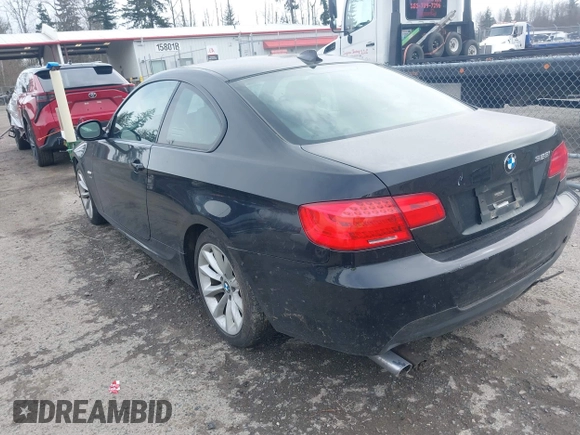2013 BMW 3 Series 328i xDrive with VIN WBAKF3C50DJ385511, listed as a IAAI auction lot 41795976 with 134,057 mi miles. Bid and sale history available at carsss.com. Image 3.