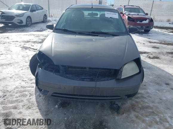 2007 Ford Focus S z VIN 1FAHP31N87W243692, wystawiony jako IAAI lot #41312958 z przebiegiem 184 717 mil mil oraz . Historia ofert i sprzedaży dostępna na DreamBid. Obrazek 12.
