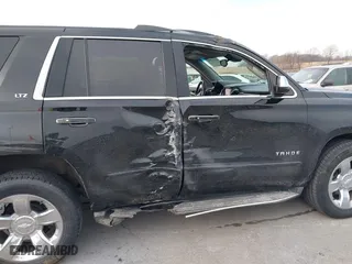 2016 Chevrolet Tahoe LTZ with VIN 1GNSKCKC9GR217166, listed as a IAAI auction lot 41152096 with 133,589 mi miles. Bid and sale history available at carsss.com. Image 6.