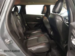 2015 Jeep Cherokee Trailhawk with VIN 1C4PJMBB4FW528633, listed as a IAAI auction lot 42147632 with 166,669 mi miles and . Bid and sale history available at DreamBid. Image 8.