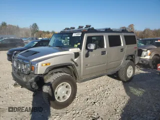 2003 Hummer H2 with VIN 5GRGN23U23H138301, listed as a Copart auction lot 77449044 with 172,174 mi miles and Salvage Title. Bid and sale history available at carsss.com. Image 1.