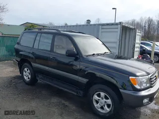 1998 Toyota Land Cruiser with VIN JT3HT05J2W0017214, listed as a IAAI auction lot 41716028 with 214,047 mi miles. Bid and sale history available at carsss.com. Image 1.