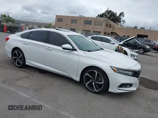 2020 Honda Accord Sport with VIN 1HGCV2F3XLA022129, listed as a IAAI auction lot 42124618 with 73,561 mi miles and . Bid and sale history available at DreamBid. Image 1.
