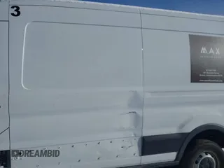 2016 Ford Transit Cargo z VIN 1FTYR2CM2GKA98918, wystawiony jako IAAI lot #41456987 z przebiegiem 51 290 mil mil oraz . Historia ofert i sprzedaży dostępna na DreamBid. Obrazek 17.