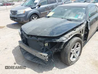 2012 Chevrolet Camaro 1LT z VIN 2G1FB1E30C9198434, wystawiony jako IAAI lot #42049821 z przebiegiem 180 813 mil mil oraz . Historia ofert i sprzedaży dostępna na DreamBid. Obrazek 6.