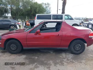 1995 Honda del Sol S with VIN JHMEG1144SS003580, listed as a IAAI auction lot 41701598 with 276,749 mi miles. Bid and sale history available at carsss.com. Image 14.