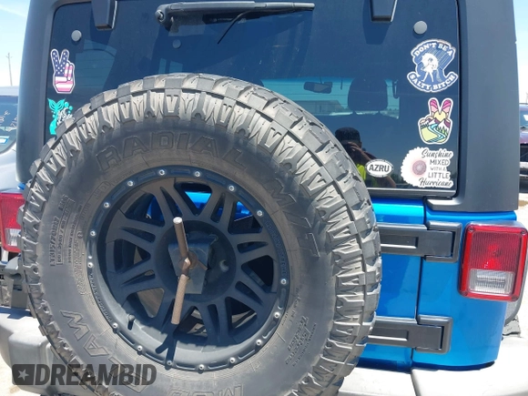 2016 Jeep Wrangler Unlimited Sport with VIN 1C4BJWDG2GL296485, listed as a IAAI auction lot 42177026 with 113,971 mi miles and . Bid and sale history available at DreamBid. Image 16.