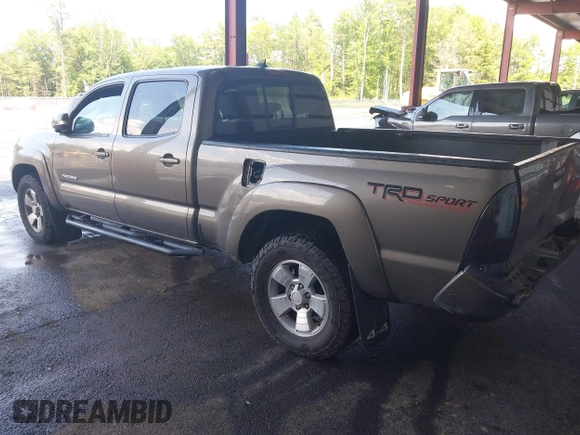 2014 Toyota Tacoma with VIN 3TMMU4FN4EM072128, listed as a IAAI auction lot 42479725 with 287,877 mi miles and . Bid and sale history available at DreamBid. Image 3.