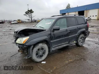 2004 Lexus GX 470 with VIN JTJBT20X140059411, listed as a Copart auction lot 52167715 with 211,520 mi miles and Clean Title. Bid and sale history available at carsss.com. Image 1.