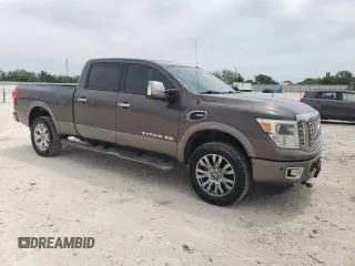 2016 Nissan Titan Platinum Reserve z VIN 1N6BA1F27GN507136, wystawiony jako Copart lot #53681615 z przebiegiem 155 101 mil mil oraz Czysty tytuł • Clean title. Historia ofert i sprzedaży dostępna na DreamBid. Obrazek 4.
