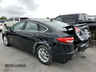 2019 Ford Fusion Hybrid SEL with VIN 3FA6P0MU5KR235893, listed as a Copart auction lot 49295113 with 129,936 mi miles. Bid and sale history available at carsss.com. Image 2.